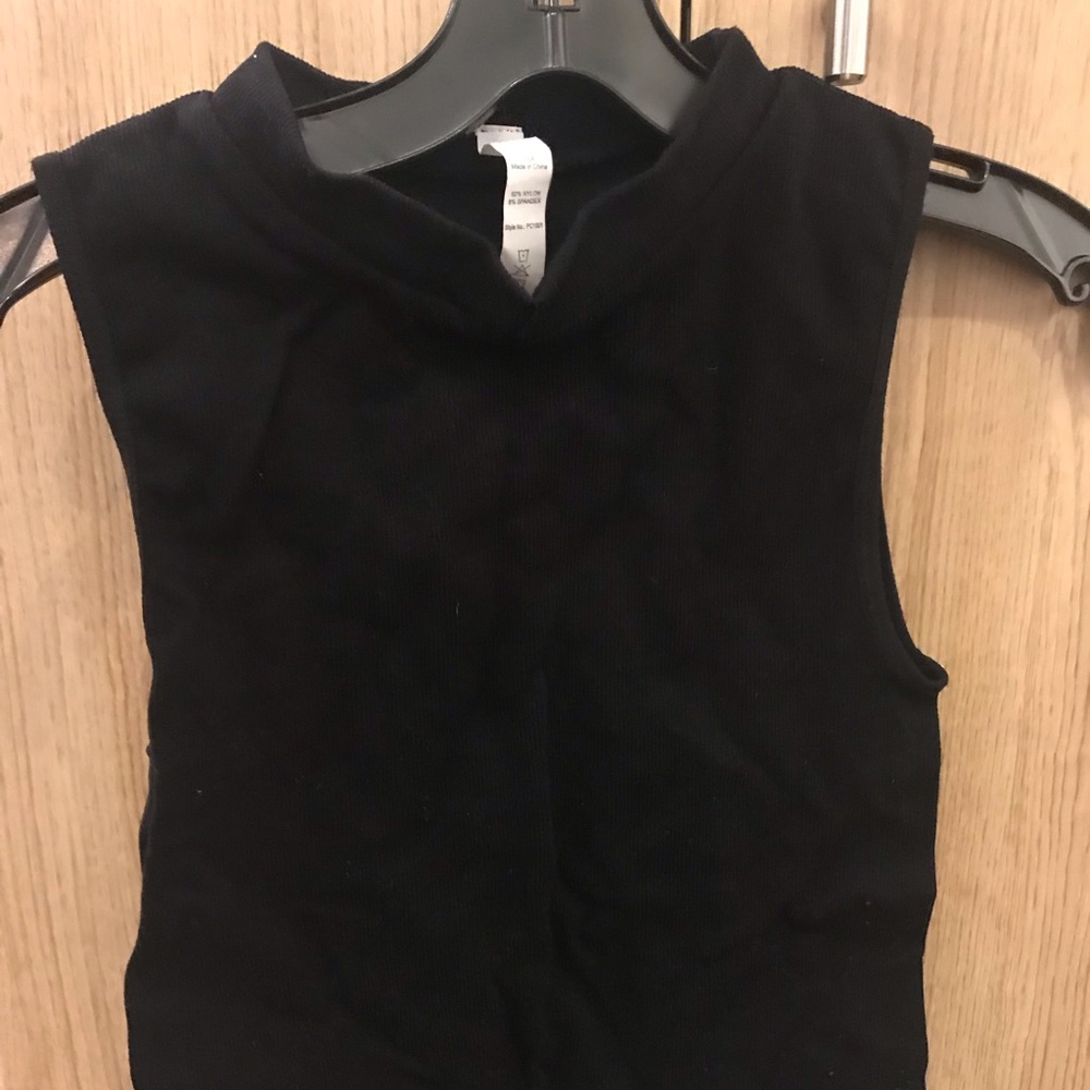 Tight black tank top with a small turtle neck